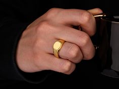 Cool 10k gold men ring, Plain 14k gold pinky signet ring for men, 10k gold mens fashion ring for husband, Unique pinky signet ring for dad This cool plain solid gold pinky signet ring is a timeless piece for the modern man. Crafted from high-quality solid gold, this minimalist ring is perfect for everyday wear or special occasions. Whether as a fashionable accessory for your husband or a unique gift for your dad, this solid gold ring embodies both elegance and durability. Its sleek, polished fin Gold Men Ring, Signet Ring For Men, Pinky Signet Ring, Mens Rings Fashion, Men Ring, Ring For Men, Minimalist Ring, Solid Gold Rings, Exclusive Jewelry