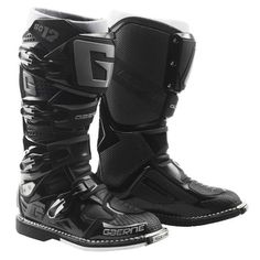 Quality. Comfort. Pride. Choices create champions, but support is what keeps them at the top, which is why the SG-12 Enduro Boot is the choice for riders who aspire to rise above the competition. From box to bike within minimal break-in, these boots are made in Italy by practiced hands that step-by-step layer support, security and comfort into each boot. Offering a streamlined toe box for precision control, a dual-stage pivot system for more aggressive riders, an anti-shock composite sole for better connection to the pegs, slimline inner grip guard panels for better control and grip of the bike, foam interior for a customized fit, and an adjustable shin plate for more room around the calves, the SG-12 Enduro lets a rider focus less on gear and more on the ride. Streamlined toe box Dual-sta Big Legs, Motorcycle Boots, Dirt Bike, Gore Tex, Boots Black, Motocross, Winter Boot, All Black, Black Boots