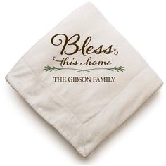 a white dish towel with the words, blessing this home on it