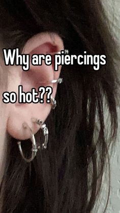 a woman with ear piercings that says why are piercings so hot?