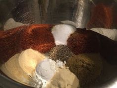 a bowl filled with different types of spices