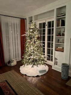 a decorated christmas tree in a living room