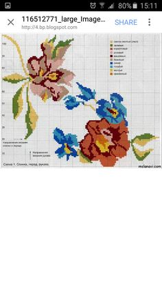 a cross stitch pattern with flowers and leaves on the bottom half of it, which is shown