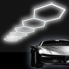 a futuristic car is shown in the dark