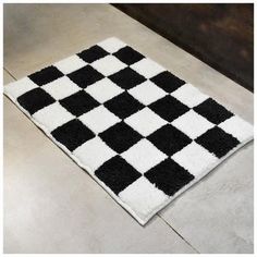 a black and white rug on the floor