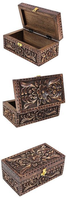 three wooden boxes with decorative designs on the top and bottom, one is open to reveal its contents