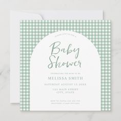 a baby shower is shown with green gingham checkered paper on the front