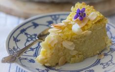 a piece of cake on a blue and white plate