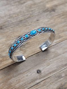 10 mm Turquoise cuff bangle  Dimensions   L X W   7.5 inch x 10 mm  All our Silver Jewelry are 925 stamped and 92.5% Pure Sterling silver. We do not use Nickel.  The stones used in our Jewelry are all Natural Gemstones  💎. The item listed in the page is the actual item for sale. We have listed the dimensions of the Jewelry in item details. If you should require any other specific dimensions, please message us . 📦Shipping & Exchange of items ----------------------------------------------- 30 Da Bohemian Sterling Silver Turquoise Bracelet, Turquoise Sterling Silver Bohemian Bangle, Bohemian Turquoise Sterling Silver Bangle, Bohemian Blue Sterling Silver Bangle, Turquoise Jewelry Boho, Gem Show, Sterling Silver Bangle, Turquoise Cuff, Jewelry Boho