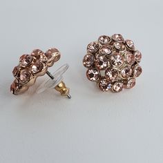 These darling pink faux diamond dome-shaped stud button earrings are vintage from the 1980s and will add a nice sparkle to a costume design or when going out on the town. Measures approximately 0.5" diameter These unique earrings can make a truly unique and meaningful gift, perfect for everyday wear or special occasions.  Captivating with their simple yet sophisticated design, they presenting an elegant and warm atmosphere. Pet-Free & Smoke-Free Environment 𝗧𝗵𝗮𝗻𝗸𝘀 𝗳𝗼𝗿 𝗹𝗼𝗼𝗸𝗶𝗻𝗴! Lisa & Kati | ArtisticFire | Minnesota Antique Pink Earrings For Gift, Vintage Rose Gold Flower Earrings Gift, Victorian Style Pink Earrings For Gift, Vintage Rose Design Earrings For Gift, Vintage Pink Flower-shaped Earrings, Jewelry Rose Gold, Button Earrings, Sophisticated Design, Present Gift