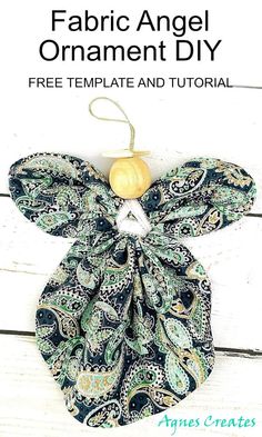 an angel ornament made out of fabric with the words free template and instructions