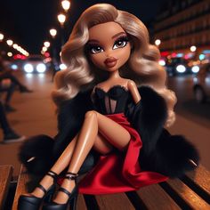 a barbie doll sitting on top of a wooden bench next to a city street at night