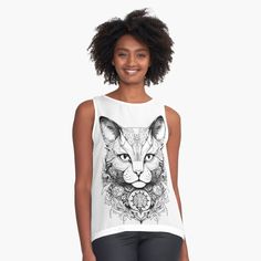 a woman wearing a tank top with an image of a cat's face on it