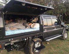 the truck bed is open and ready to be slept in