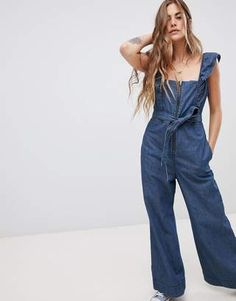 Free People Sun Valley Denim Tie Front Jumpsuit Free People Spring, Beige Jumpsuit, Leeds Festival, Free People Clothing, Sun Valley, Free People Denim, Printed Jumpsuit, Denim Jumpsuit, Online Shopping Clothes