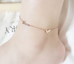 Item Stock Number: 134 •Material:  Titanium Stainless Steel (316 L) with 3 layers of 18 K gold •Color:           Rose Gold (Long last color, color stay with shower) •Pendant Size:  Love: 6.5 mm x 15 mm, Heart: 6.7 mm x 10 mm •Chain Length: Adjustable, from 8 inches to 10 Inches.  Titanium is widely used in medical appliance, such as surgery tools.  According authority of medical circle, titanium material is in-noxious to human body. It is also radiation-resistant and corrosion-proof. It used to be precious, so it is widely applied in aerospace.  The allergic possibility is almost as low as 925 sterling silver, because titanium is safe with skin contact.  It comes with a box. ♥ Perfect for daily wear. Fashion and Stylish. SHIPPING AND HANDLE:  ♥ All the items will be shipped in one business Heart Anklet, Anklet Bracelet, Anklet Jewelry, 3 Layers, Chain Lengths, Fashion Watches, Chain Length, Anklets, Women Girl