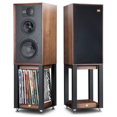 two wooden speakers sitting side by side on top of each other in front of a white background