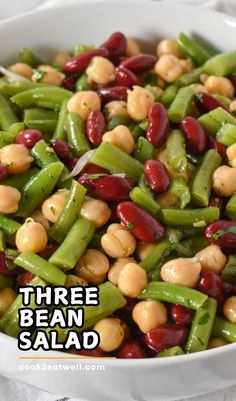 beans and bean salad in a white bowl with the words three bean salad above it