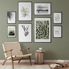 a living room with green walls and pictures hanging on the wall, including a chair