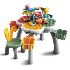 the children's table and chairs are designed to look like they have toys on them