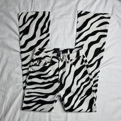 Nwot Fashion Nova Megan Thee Stallion Black & White Zebra Print Jeans Never Worn, Washed And Has Been Sitting In My Closet Since For The Tall Individuals! Tag Listed Size 3, Refer To Measurements To Ensure An Accurate Fit Sold Out On Fashion Nova Website, Will Probably Never Come Back In Stock Measurements Laid Flat: - Waist Measures About 13.5" - Rise Measures About 10.5" - Inseam Measures About 34" Never Come Back, Thee Stallion, Megan Thee Stallion, Print Jeans, White Zebra, Printed Jeans, Fashion Nova Jeans, Back In Stock, In The Wild