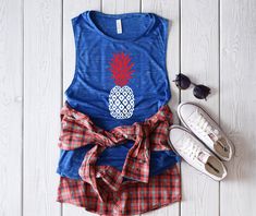 4th of july pineapple shrit, usa tank, fourth of July tank, patriotic tank, memorial day tank, 4th of July shirt, red white blue tank *T- SHIRT INFO* A fashion-forward tank in a super soft and flowy poly-viscose blend. The cropped and boxy silhouette, round neck and elongated arm holes make this style perfect for layering. Offered in a variety of solid, neon and striped colors. Features: Sideseamed. Boxy fit. Cropped body length. *FABRICATION* 65% Polyester, 35% Viscose Marbles are 3.5 oz., 91/9 Casual American Flag Print Tank Top, Casual American Flag Print Sleeveless Tank Top, Red Graphic Print Tank Top For Summer, American Flag Print Cotton Tank Top For Independence Day, Red Summer Tank Top For Beach Season, Sleeveless Summer Top With Flag Print, Sleeveless Flag Print Summer Top, 4th Of July American Flag Print Cotton Tank Top, Summer American Flag Print Tank Top