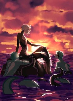 a woman sitting on top of a rock in the ocean next to two other mermaids