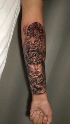 a person with a tattoo on their arm