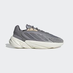 Chaussure Ozelia - Blanc adidas | adidas France Ozelia Shoes, Adidas Ozweego, Sneakers Men Fashion, Adidas Online, White Adidas, Free Kids, Puma Sneaker, Adidas Originals, Slip On Sneaker