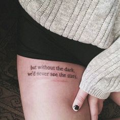 a woman's leg with a tattoo saying, but without the dark we'd never see the stars