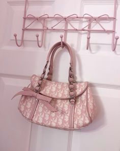 #dior #purse #romantic #bow #coquette #pink #pinkaesthetic #lanadelrey #lana #softgirl #coquettefashion #coquettestyle #pinkdior Luxury Vintage Pink Shoulder Bag, Coquette Designer Bag, Feminine Pink Bag With Bow, Pink Shoulder Bag With Bow, Coquette Crossbody Bag, Vintage Dior Bag, Dior Purse, Purse Essentials, Pink Chanel