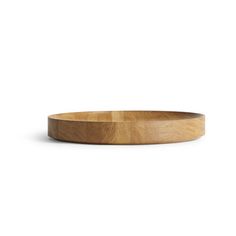 a wooden bowl on a white background