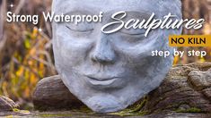 a stone mask sitting on top of a tree stump with the words strong waterproof sculptures no kiln