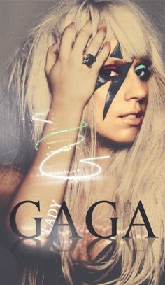 a woman with face paint holding her hands to her face and the words gaga written on it