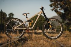 a bike parked in the middle of a field