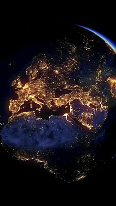 the earth is lit up at night from space