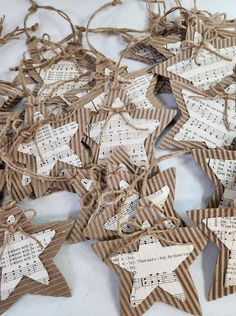 some brown and white paper stars with musical notes on them