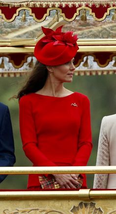 the duke and princess of cambridge look on from their carriage