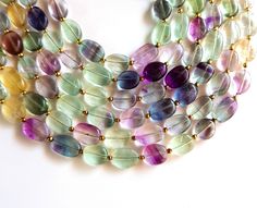 Rainbow Fluorite Gemstone Smooth Briolette's | Natural Fluorite Ovals Beads Size - 8x10 -- 8x12 MM 8 Inch Fluorite Nuggets [NFBA 11] Gemstone -- 100% Natural Length -- 8 Inch Shape -- Oval / Nuggets Cut -- Brilliant Faceted Size - 8x10 -- 8x12 MM Approx. Transparency -- Translucent Quality -- Top Quality Luxury Briolette Gemstone Beaded Necklace, Natural Stone Oval Beads For Jewelry Making, Natural Oval Beads Gemstones For Jewelry Making, Oval Faceted Beads For Jewelry Making, Handmade Oval Bead Gemstones For Jewelry Making, Oval Stones For Jewelry Making, Oval Natural Stones For Jewelry Making, Fluorite Gemstone, Fluorite Necklace