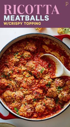 a large pot filled with meatballs and sauce