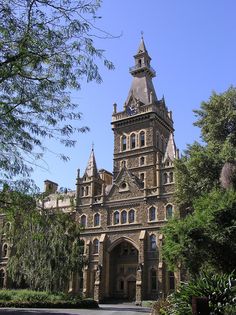 an old building with a clock tower on top