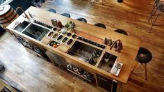 an overhead view of a kitchen with wooden floors