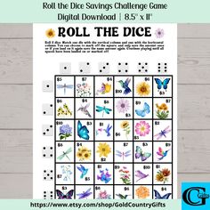 a printable roll the dice game with flowers and butterflies in it on a wooden table