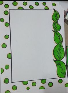 a drawing of a green plant with dots on it and a white paper in the middle