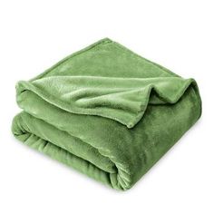 a light green blanket folded on top of each other