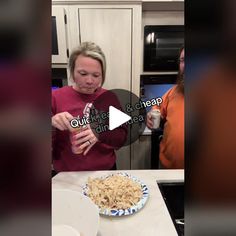 a woman is making pasta in the kitchen