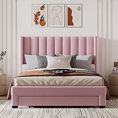 a bed with pink headboard and foot board in a white room next to two pictures on the wall