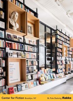 the bookshelves are filled with many different types of books