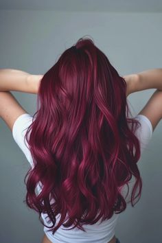 Dive into our curated collection of 35 stunning burgundy hair color ideas. From the mulberry hair color you see here to shiny amaranth shades, find your next hair inspiration here! Click to check it all out now and pin your favorites! Simple Fun Hair Color Ideas, Dark Red Hair With Purple Undertones, Dark Red Hair Color Burgundy Purple Fall, Dark Bright Red Hair, Mulled Wine Hair Color With Highlights, Berry Colored Hair, Peek A Boo Red Hair, Bright Burgundy Hair, Burgundy Hair Plum