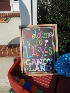 a sign that says welcome to lily's candy land